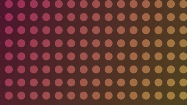 Polka dot pattern with warm gradient colors on a desktop screen