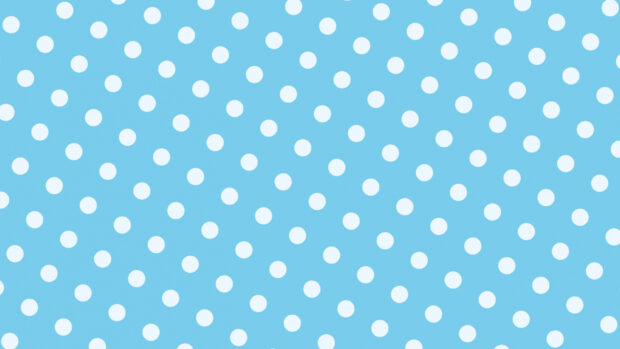 White polka dot pattern on a blue surface with evenly spaced circles