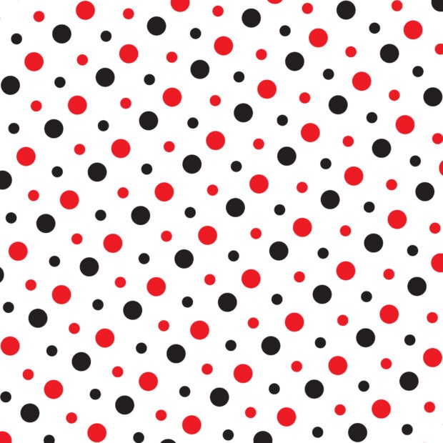 Red and black polka dot pattern with various sizes on white background