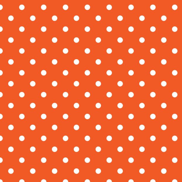 White polka dot pattern on orange background for phone decoration