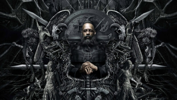 A man with a beard surrounded by dark fantasy sculptures and symbols in a detailed scene