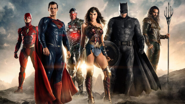 A poster featuring iconic Justice League characters standing together in a dramatic setting