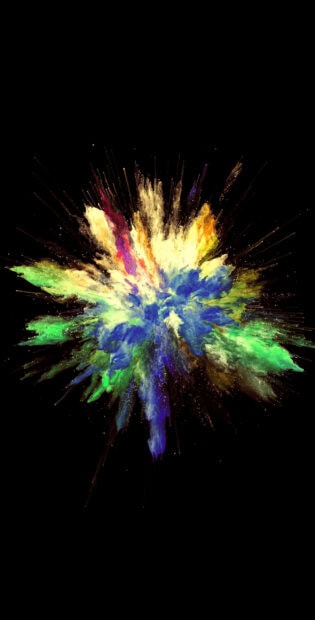 Vibrant powder explosion creating colorful abstract art in vivid powder