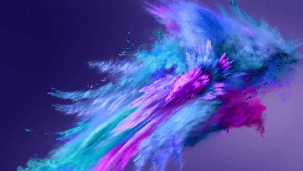 Vibrant powder explosion in purple and blue colors creating a dynamic abstract design