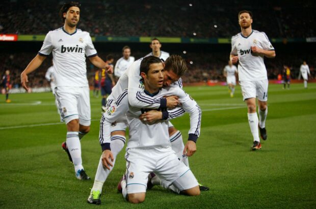 Real Madrid Cf player celebrating a goal during a football match on the field