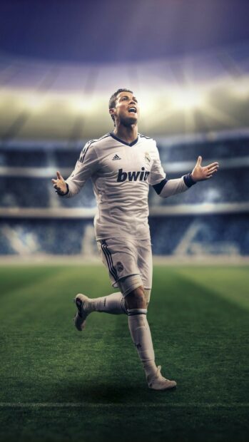 Cristiano Ronaldo celebrating on the field in Real Madrid Cf jersey
