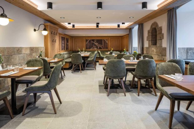 Modern restaurant interior with wooden furniture and comfortable seating arrangements