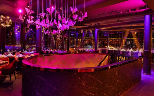 Elegant restaurant interior with modern design and luxurious dining setup in vibrant colors