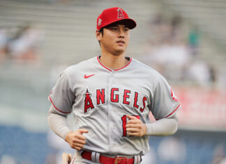Shohei Ohtani in Angels uniform running on the field during a game