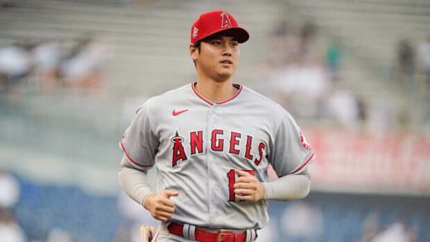 Shohei Ohtani in Angels uniform running on the field during a game