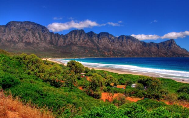 Mountain range and ocean coastline representing South Africa coastal landscape