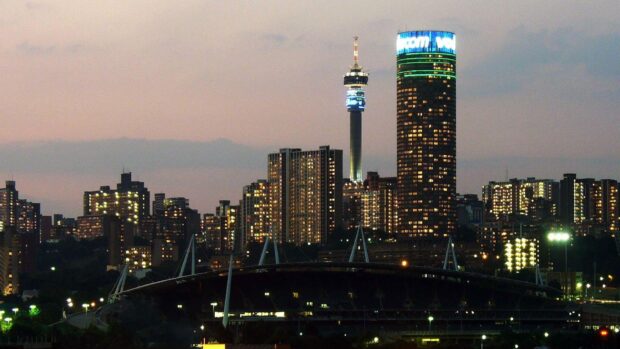 Johannesburg city skyline at dusk showing urban buildings and tower