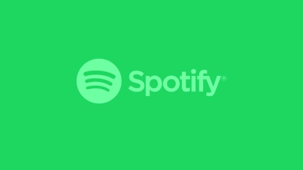 Spotify logo on a bright green background featuring the Spotify brand