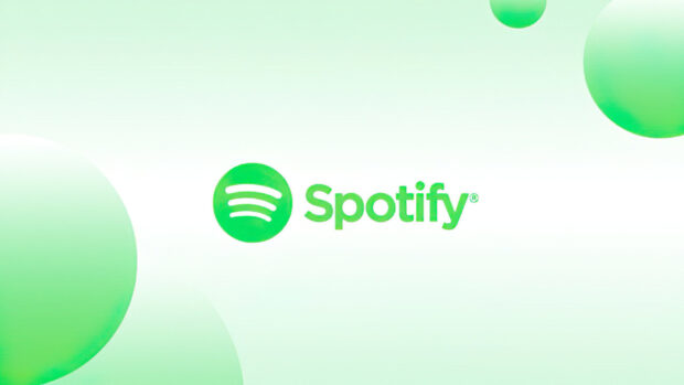 Green Spotify logo with circular shapes on a light background for desktop