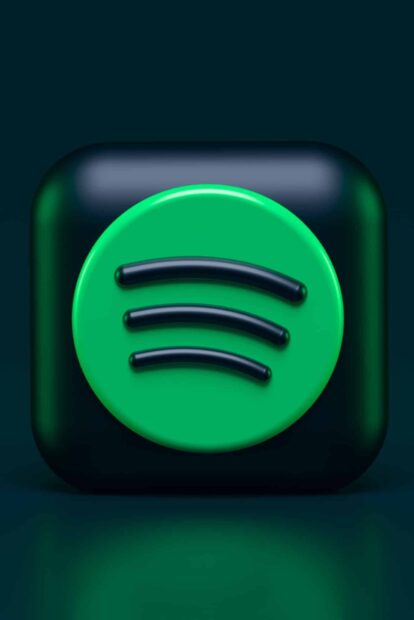 3D Spotify symbol icon in green and black on dark background with music streaming concept