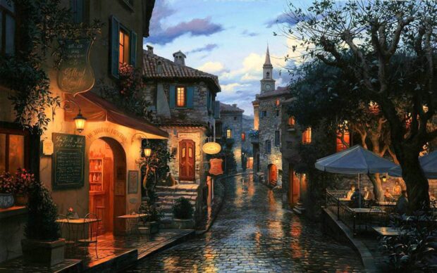 Charming town street with glowing cafes and cobblestone path at dusk