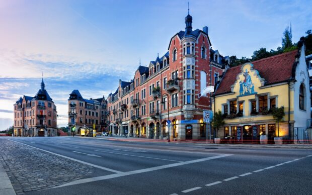 Classic town architecture with detailed historic buildings and empty street in the evening