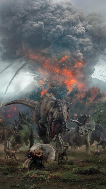 A Tyrannosaurus Rex roaring fiercely in front of other dinosaurs during a volcanic eruption