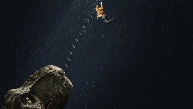 A Tyrannosaurus Rex reaching for a person climbing a ladder in the rain