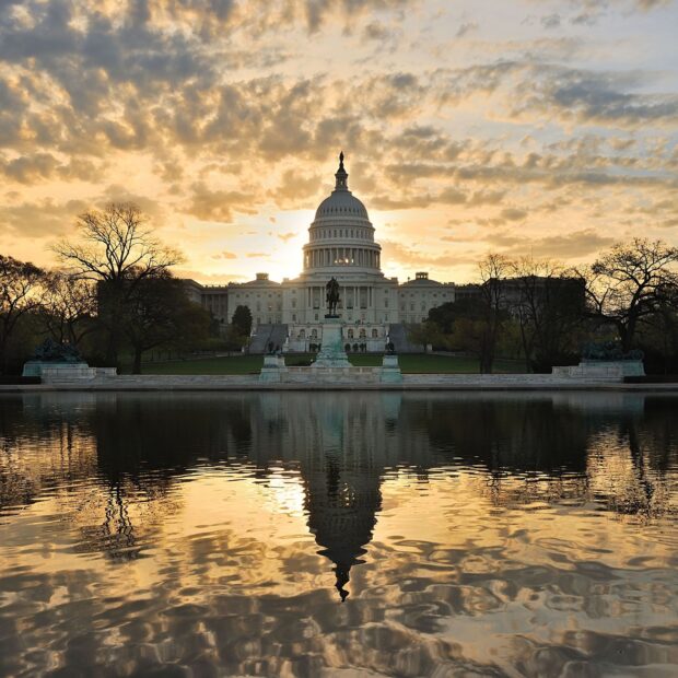 Washington Dc Capitol building reflection at sunset with Washington Dc architecture