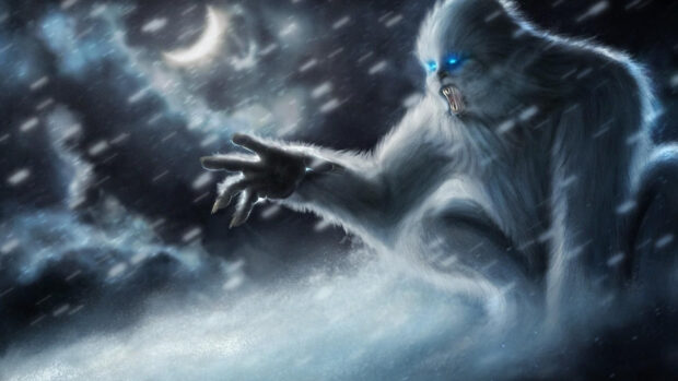 A fierce Bigfoot creature with glowing blue eyes reaching out during a snowy night