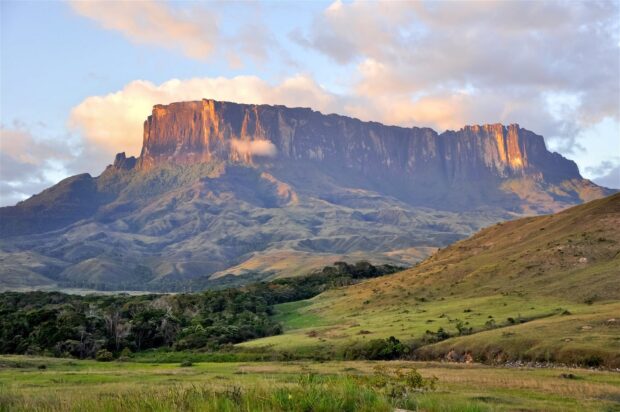 Canaima National Park scenic landscape showcasing a flat topped mountain and green valleys