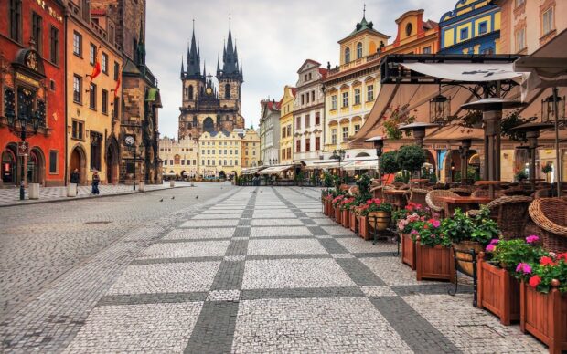 Historic city square with cobblestone streets and colorful buildings in city square