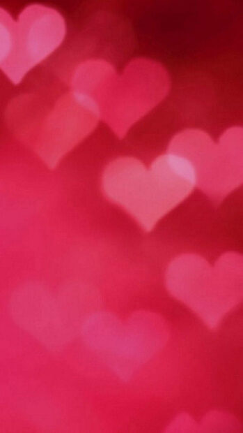 Soft pink hearts bokeh effect creating a romantic Valentines Day design