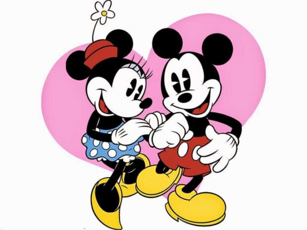 Mickey and Minnie share a joyful moment with a heart in the background Valentine's theme