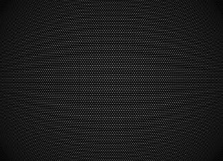 A close up view of black dots pattern creating a textured surface on a spherical shape