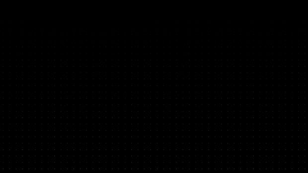 Black background with tiny evenly spaced dots forming a grid pattern