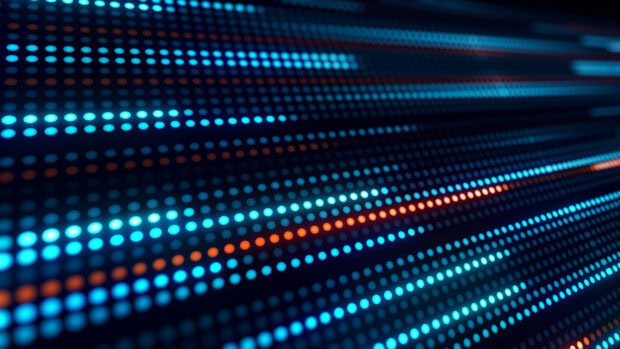 Glowing blue and orange dots arranged in diagonal lines on a dark surface