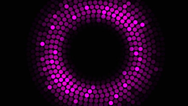Vibrant purple dots forming a circular pattern with a dark center on black background