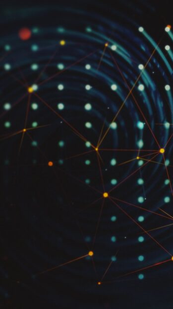 Abstract technology dots connected by lines forming a network pattern on a dark background