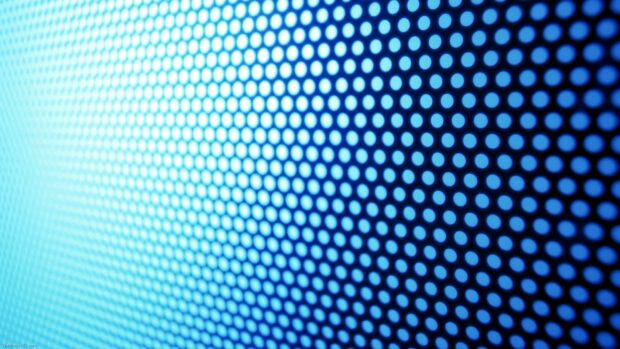 Close up view of dots pattern with blue gradient lighting on screen