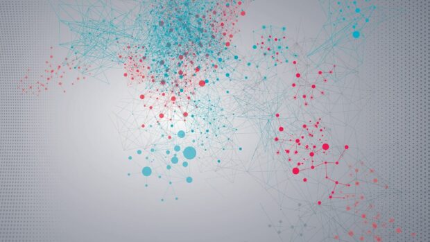 Complex network structure with blue and red dots connected by lines on a grey background