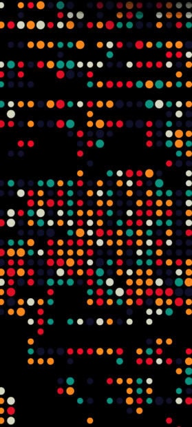Colorful dots pattern arranged randomly on black background creating a vibrant design