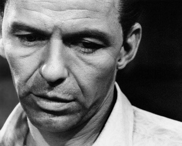 Close up portrait of Frank Sinatra showing detailed facial expression and texture
