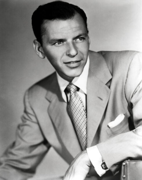 Classic Frank Sinatra portrait in a suit showing his confident expression