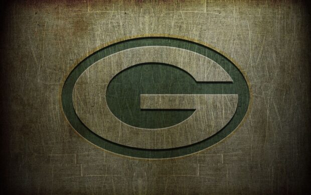 Green Bay Packers logo with a grunge texture on a dark background