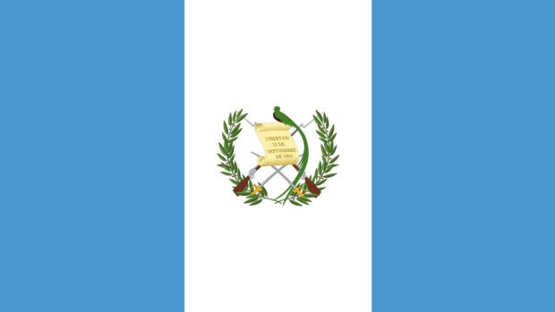 The Guatemalan emblem with swords and a scroll featuring Guatemala