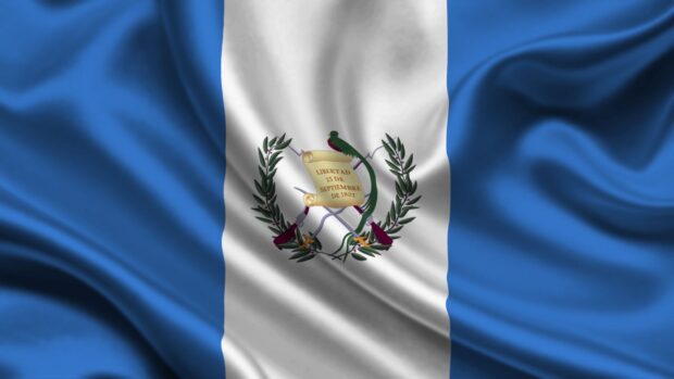 The Guatemala flag waving with a detailed coat of arms in high definition quality