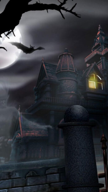 A haunted house with glowing windows under a full moon and a bat flying in the night sky