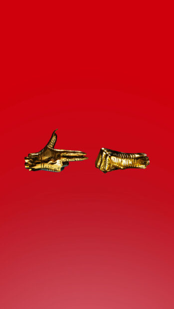 Golden sculpted hand shapes on red background featuring jewels design