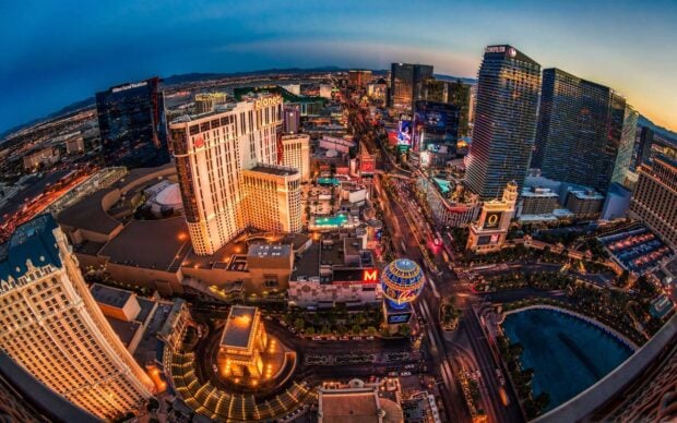 A stunning aerial view of Las Vegas Strip vibrant cityscape at dusk showcasing iconic casinos and hotels