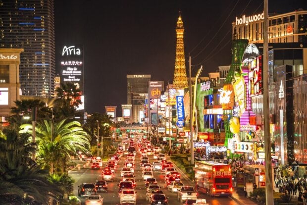 Night view of Las Vegas Strip with bright lights and busy traffic