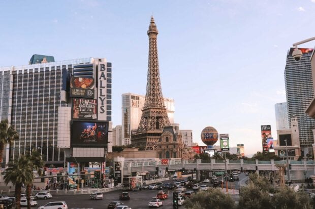 The Las Vegas Strip with Eiffel Tower replica and Ballys casino building in the cityscape