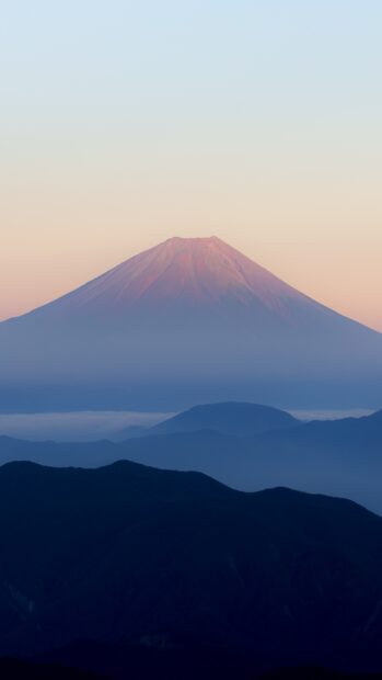 Mount Fuji Japan landscape with misty mountains at sunrise