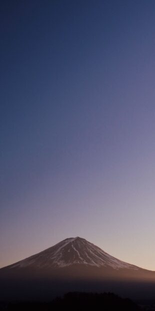 Mount Fuji Japan landscape with snow covered peak at dusk