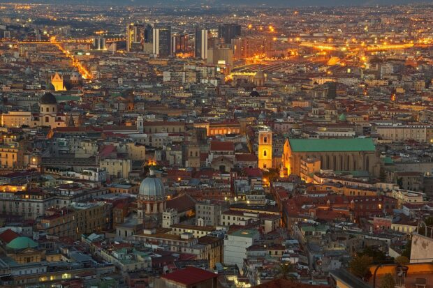 Night cityscape of Naples with illuminated buildings and urban landscape